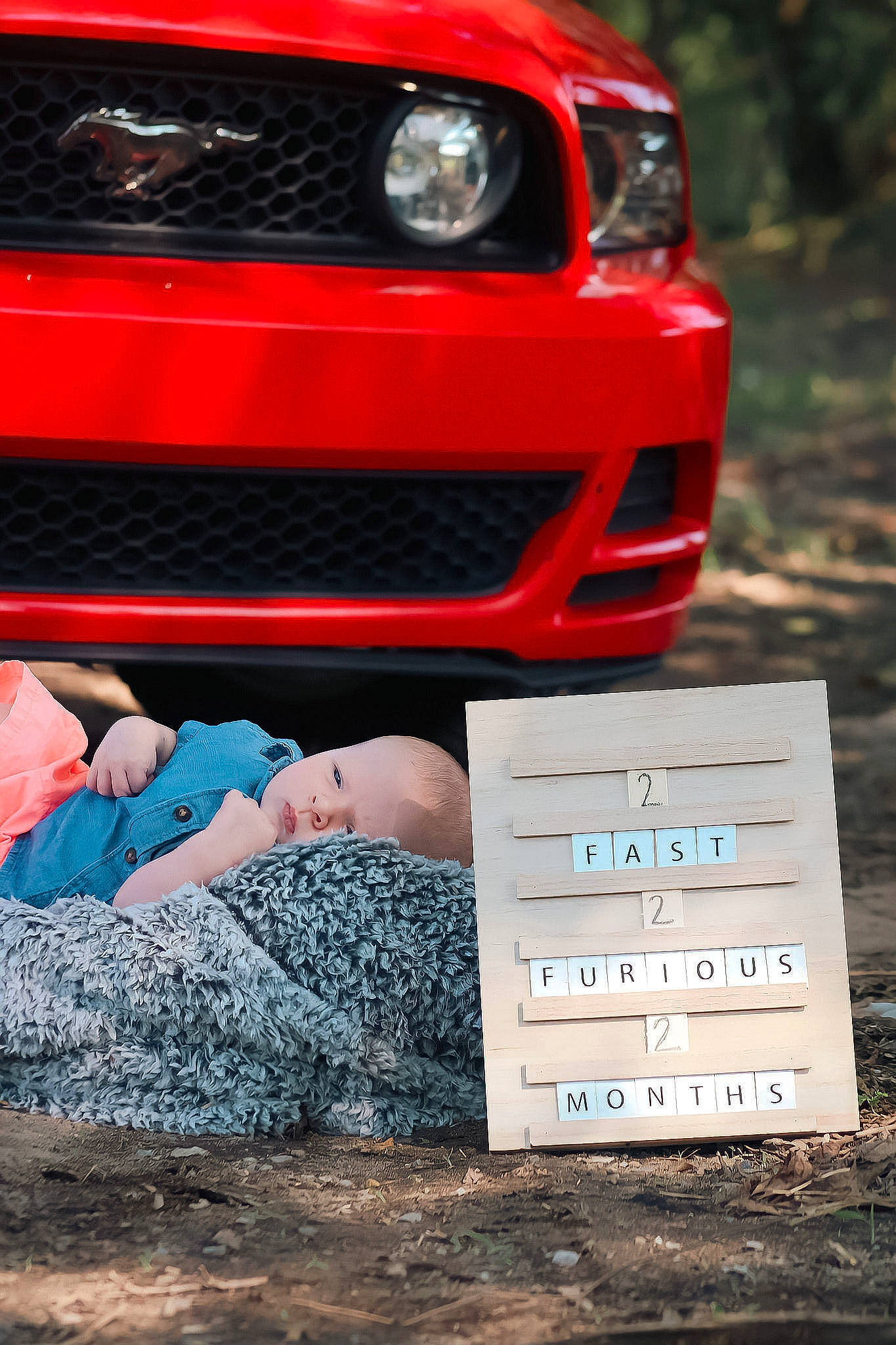 Paxton is registered to the contest to win money with this photo: alloy_wheel, automotive_design, automotive_exterior, automotive_fog_light, automotive_lighting, automotive_tire, automotive_wheel_system, bumper, car, electric_blue, fender, grille, headlamp, hood, motor_vehicle, person, personal_luxury_car, rim, tire, vehicle