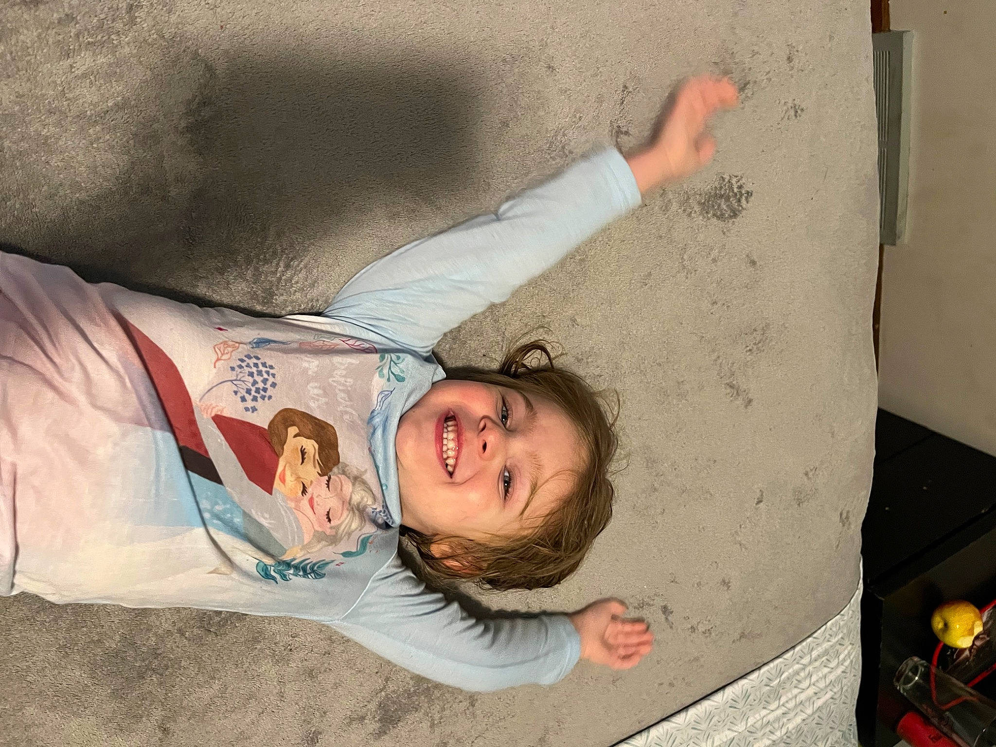 Khaleesi is registered to the contest to win money with this photo: child, comfort, concrete, elbow, fun, happy, joy, leisure, linens, person, room, skin, smile, t_shirt, textile, toddler, tree, vacation, wall, wood