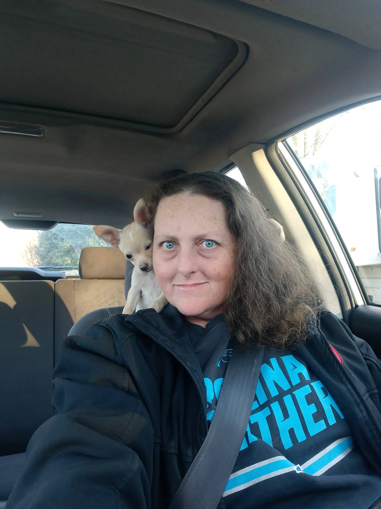 Coco joined the competition — help win amazing prizes! auto_part, automotive_design, automotive_exterior, automotive_window_part, car, car_seat, car_seat_cover, electric_blue, family_car, fun, head_restraint, luxury_vehicle, motor_vehicle, passenger, personal_luxury_car, smile, travel, vehicle, vehicle_door, windshield