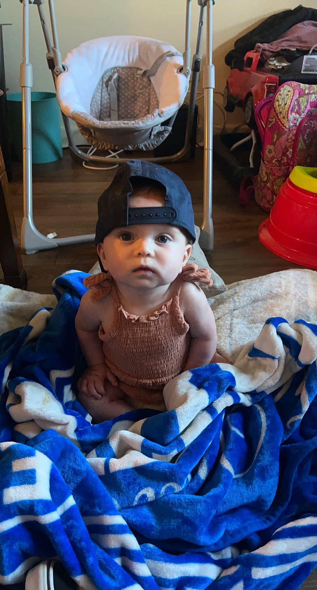 Harleigh joined the competition — help win amazing prizes! baby, baby_products, baby_toddler_clothing, bag, blue, chair, child, electric_blue, event, fashion_accessory, fedora, fun, hat, headgear, headwear, leisure, person, room, sitting, sun_hat