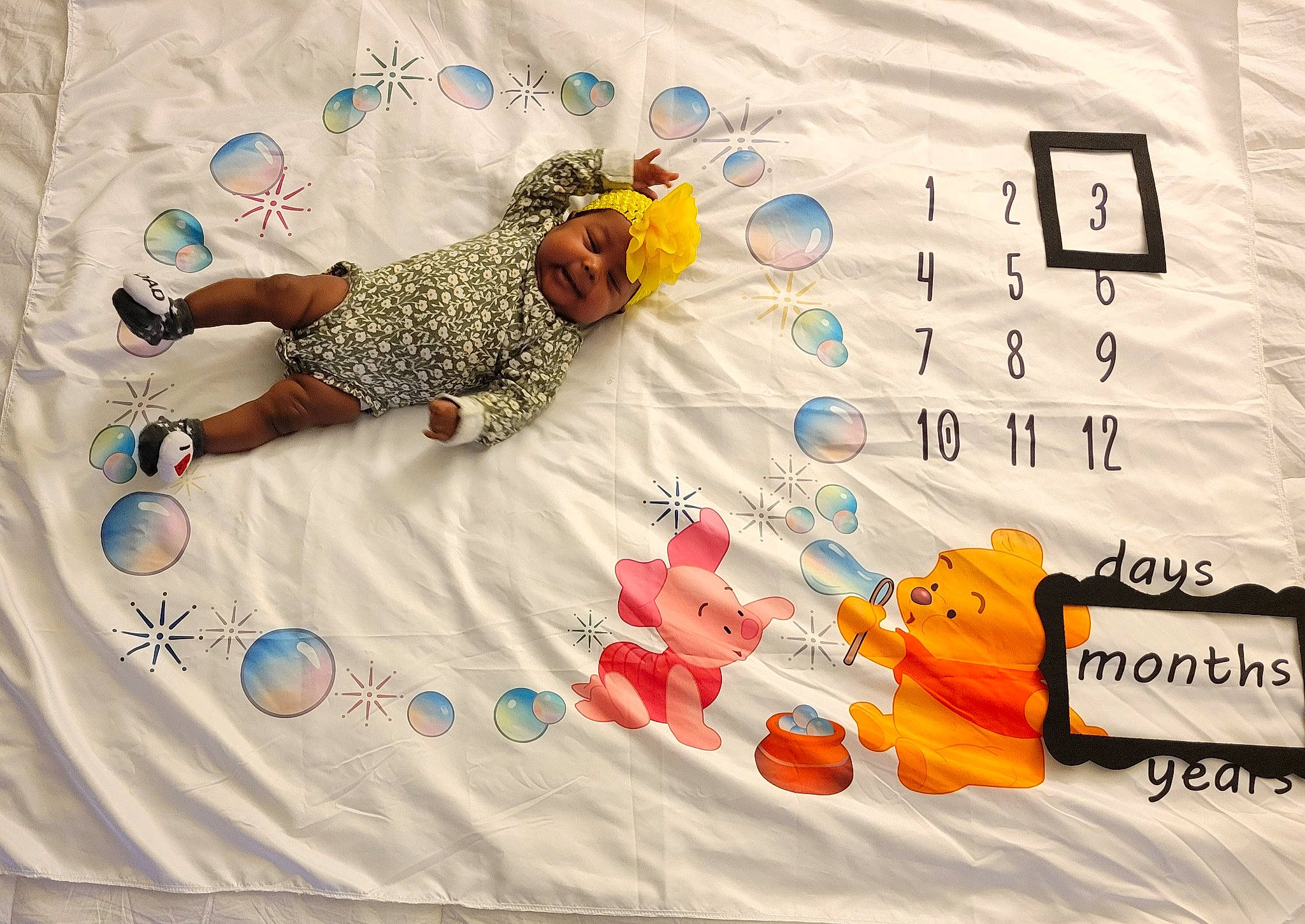 Kenley joined the competition — help win amazing prizes! baby_toddler_clothing, comfort, event, flooring, font, happy, headwear, illustration, leisure, linens, pattern, person, product, sleeve, t_shirt, textile