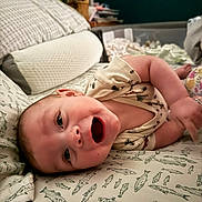 Beau joined the competition — help win amazing prizes! baby, bed, blanket, child, clothing, comfort, cozy, cute, face, fish_pattern, happy, indoors, infant, laughing, lying_down, person, pillow, room, skin, smiling