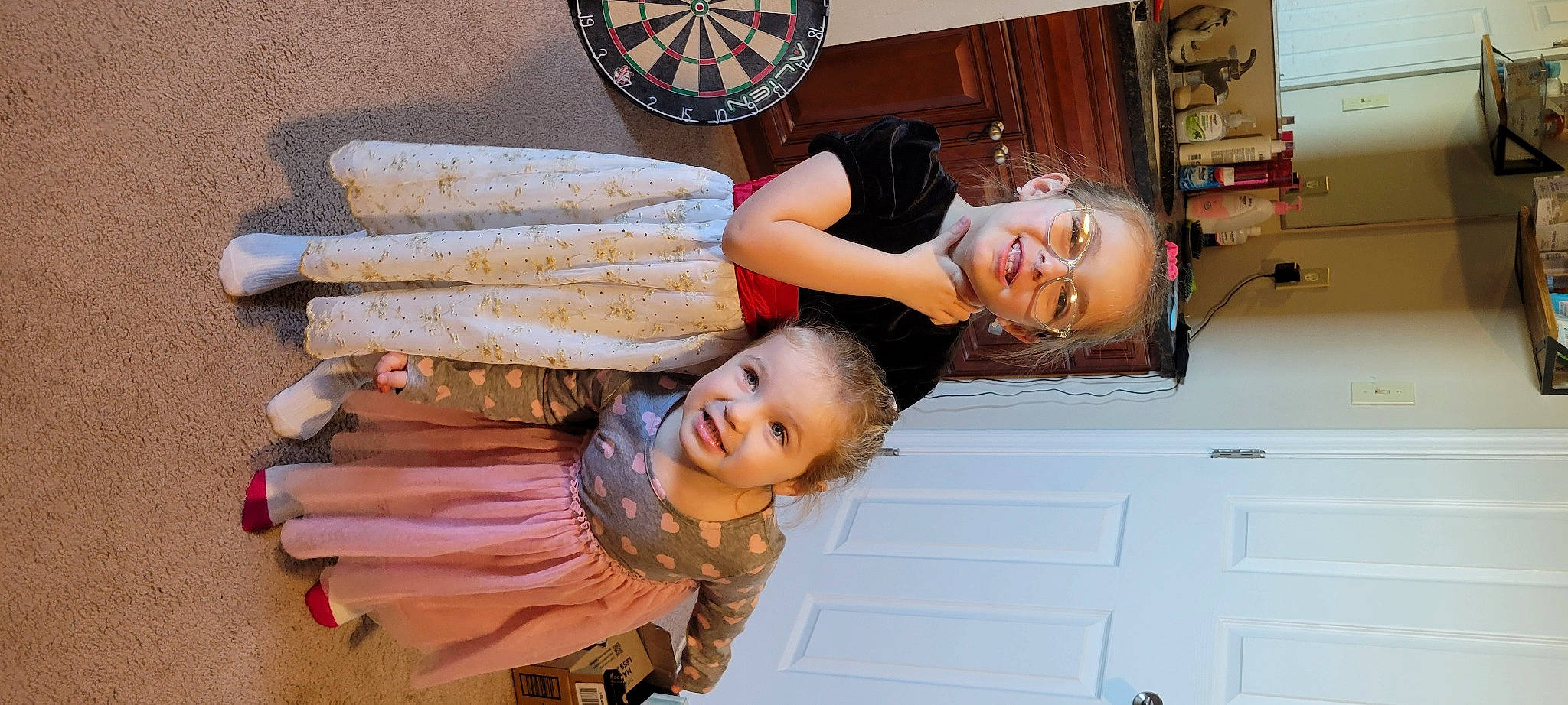 Zarinah joined the competition — help win amazing prizes! automotive_wheel_system, child, dartboard, darts, door, event, fun, happy, joy, leisure, person, photography, picture_frame, room, smile, toddler, tree, wood