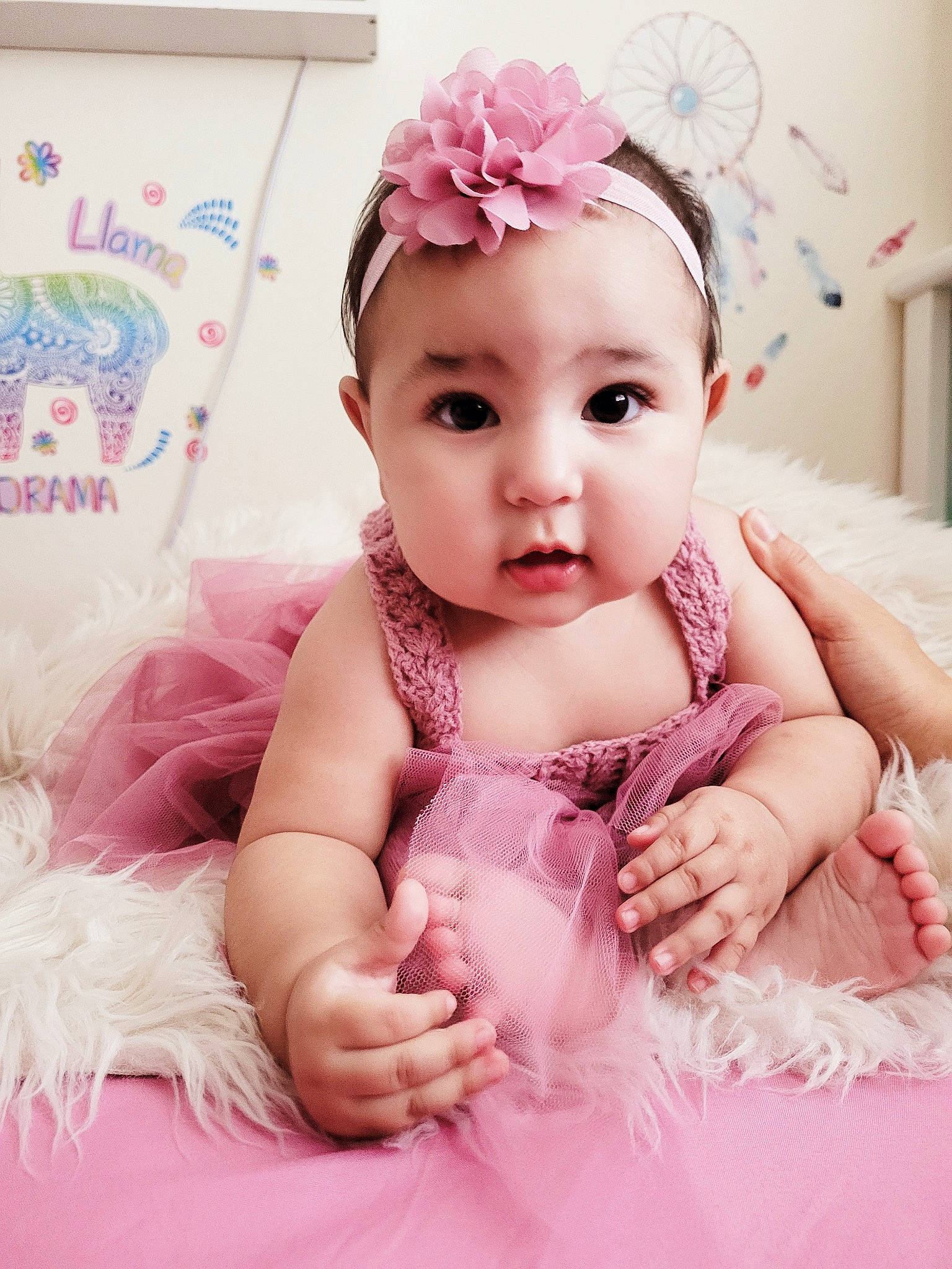 Donna is registered to the contest to win money with this photo: baby, baby_toddler_clothing, child, embellishment, eyelash, finger, happy, headband, headpiece, iris, jewellery, magenta, pattern, person, petal, pink, purple, skin, sleeve, toddler