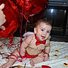 Noah is registered to the contest to win money with this photo: baby, balloons, blanket, bow_tie, celebration, child, cookies, festive, fireplace, happy, heart_balloons, indoor, infant, portrait, red_outfit, ribbons, sitting, smiling, tattooed_hand, valentines_day