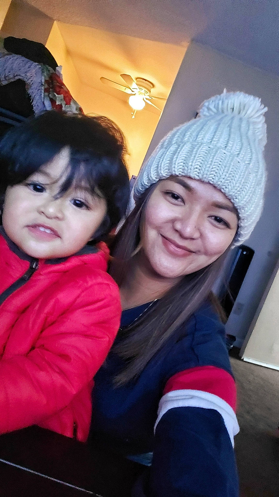 Ethan is registered to the contest to win money with this photo: cap, child, clothing, event, eye, facial_expression, fashion, fashion_accessory, fun, happy, headwear, joy, knit_cap, magenta, organ, outerwear, person, pink, smile, snapshot