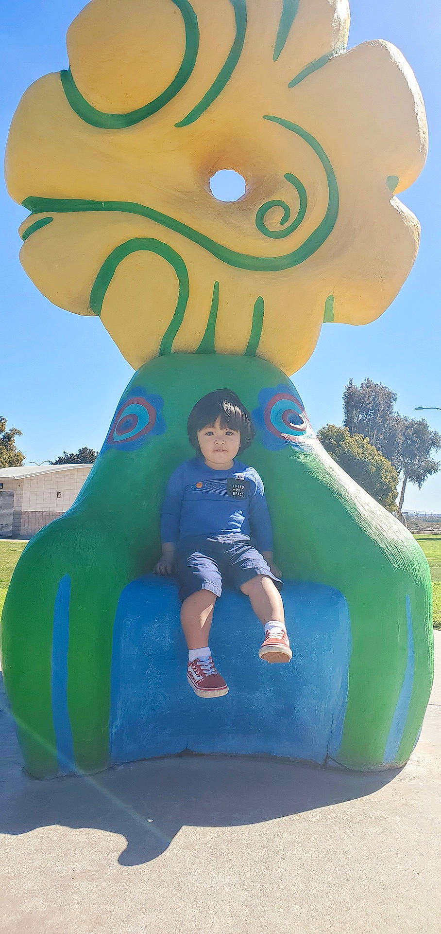 Ethan joined the competition — help win amazing prizes! blue, chute, fun, gesture, grass, green, happy, leaf, leisure, organ, people, person, photograph, plant, recreation, shorts, sky, snapshot, tree, vertebrate