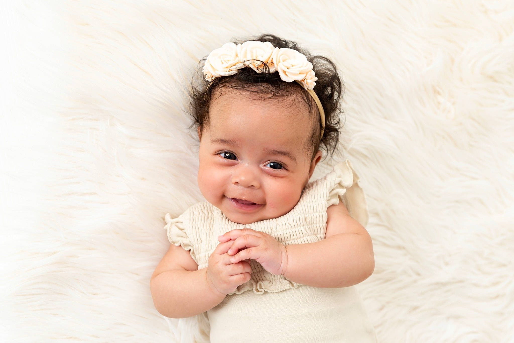 Gabrielle is registered to the contest to win money with this photo: baby, baby_toddler_clothing, cheek, chin, ear, eye, eyebrow, face, finger, flash_photography, flower, happy, head, headgear, iris, lip, person, pink, skin, sleeve