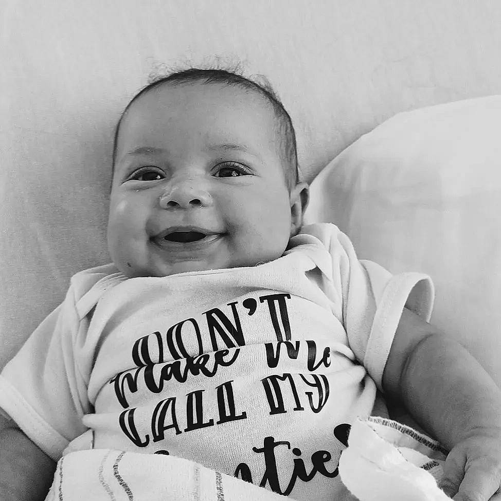 Alessia is registered to the contest to win money with this photo: arm, baby, baby_toddler_clothing, cheek, comfort, eye, eyebrow, face, facial_expression, finger, gesture, hair, happy, head, human_body, mouth, person, skin, sleeve, smile