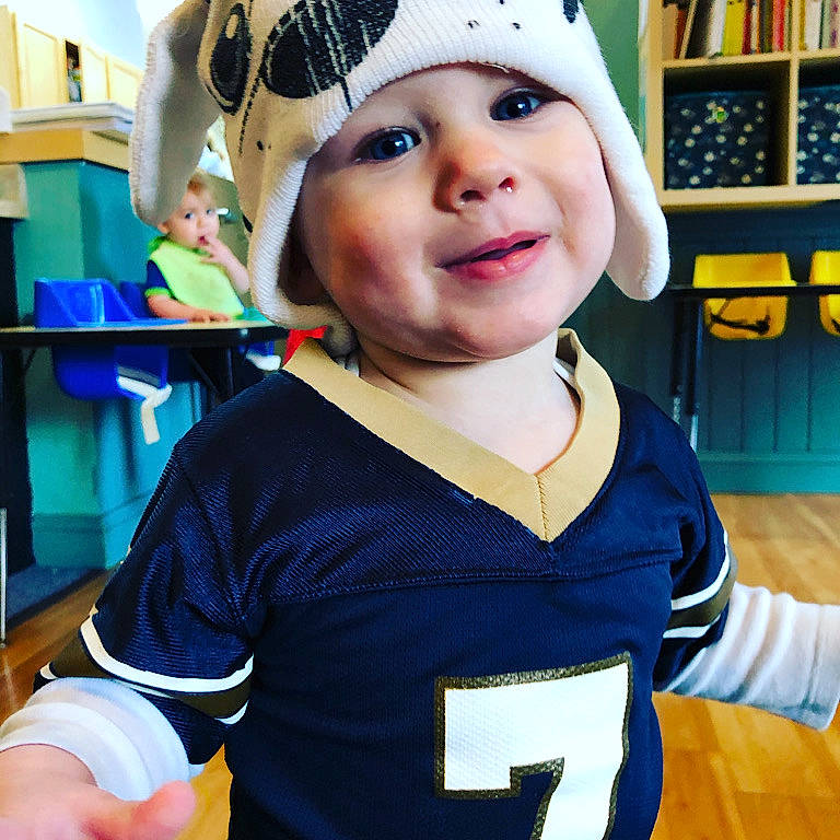 Isaac is registered to the contest to win money with this photo: baby, cap, cheek, child, cool, costume, ear, fashion_accessory, happy, hat, head, headgear, headwear, helmet, person, personal_protective_equipment, sleeve, smile, toddler, vacation