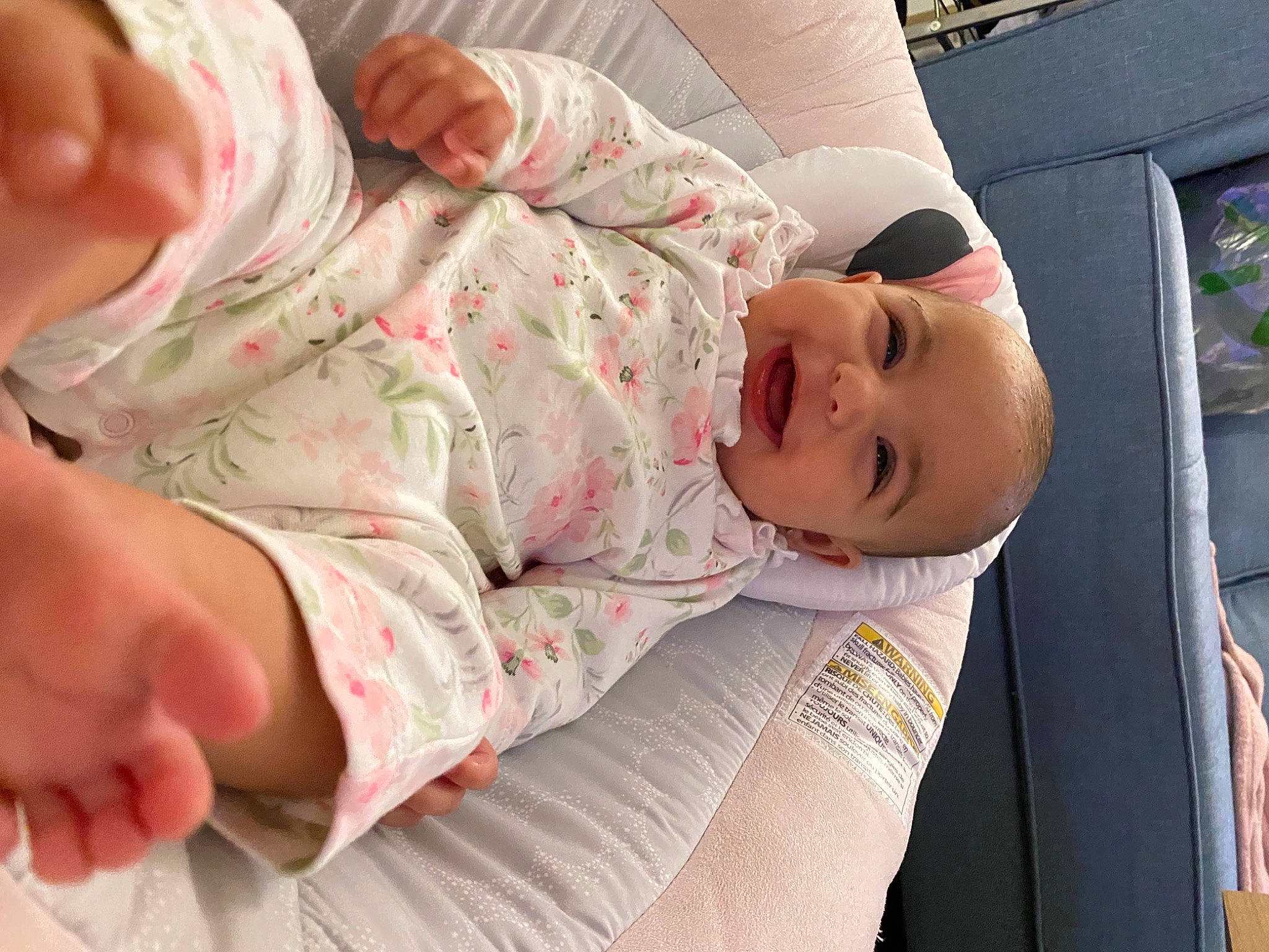 Roselynn is registered to the contest to win money with this photo: abdomen, baby, baby_toddler_clothing, cheek, child, comfort, event, eye, finger, head, human_leg, joint, linens, mouth, nose, person, pink, skin, smile, thigh