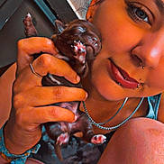 Aramis a rejoint le concours — aidez-le/la à gagner de superbes lots ! person, puppy, dog, sleeping, closeup, hand, face, piercing, smile, skin, fingers, chain, nail, cute, pet, young, indoor, warm_light, expression, holding