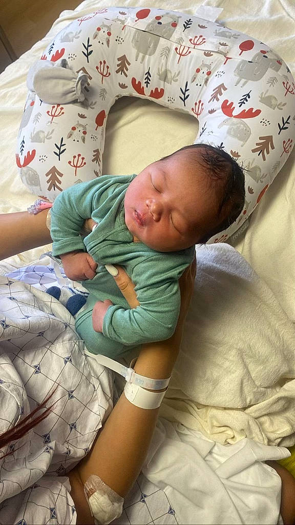 Kacey is registered to the contest to win money with this photo: baby, baby_products, baby_sleeping, baby_toddler_clothing, bedding, bedtime, child, comfort, head, linens, nap, person, room, skin, sleep, sleeve, textile, toddler