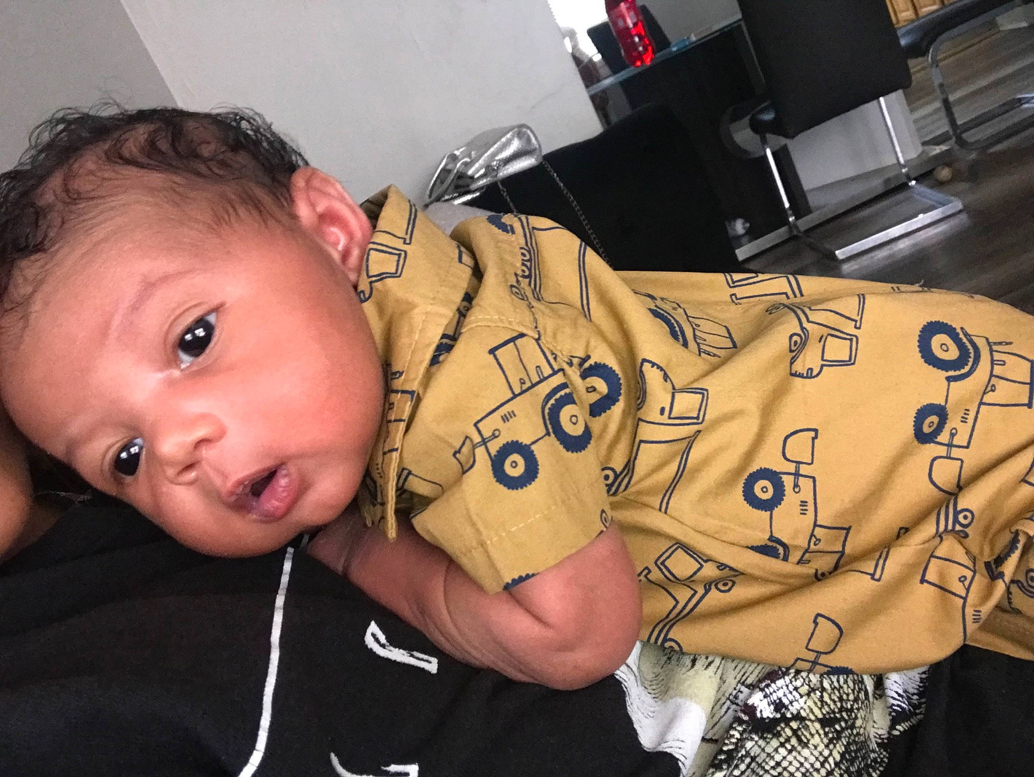 Kacey joined the competition — help win amazing prizes! baby, baby_toddler_clothing, cheek, child, couch, eyelash, eyewear, finger, fun, happy, human_body, joint, military_person, military_uniform, pattern, person, sitting, sleeve, t_shirt, toddler