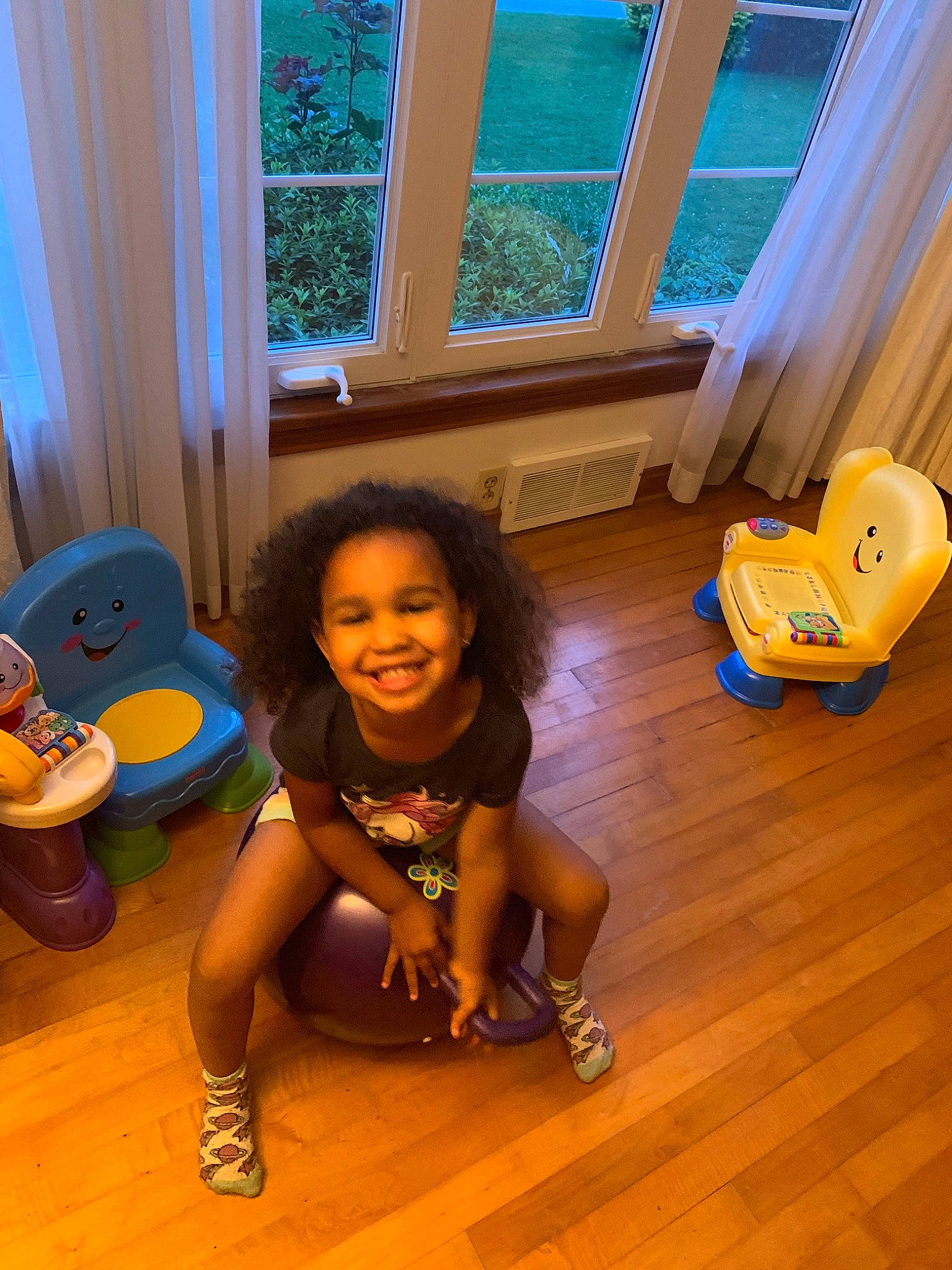 Annalise is registered to the contest to win money with this photo: baby, child, floor, flooring, fun, hardwood, house, joy, laminate_flooring, person, play, potty_training, room, sitting, smile, toddler, toy, vacation, wood, wood_flooring