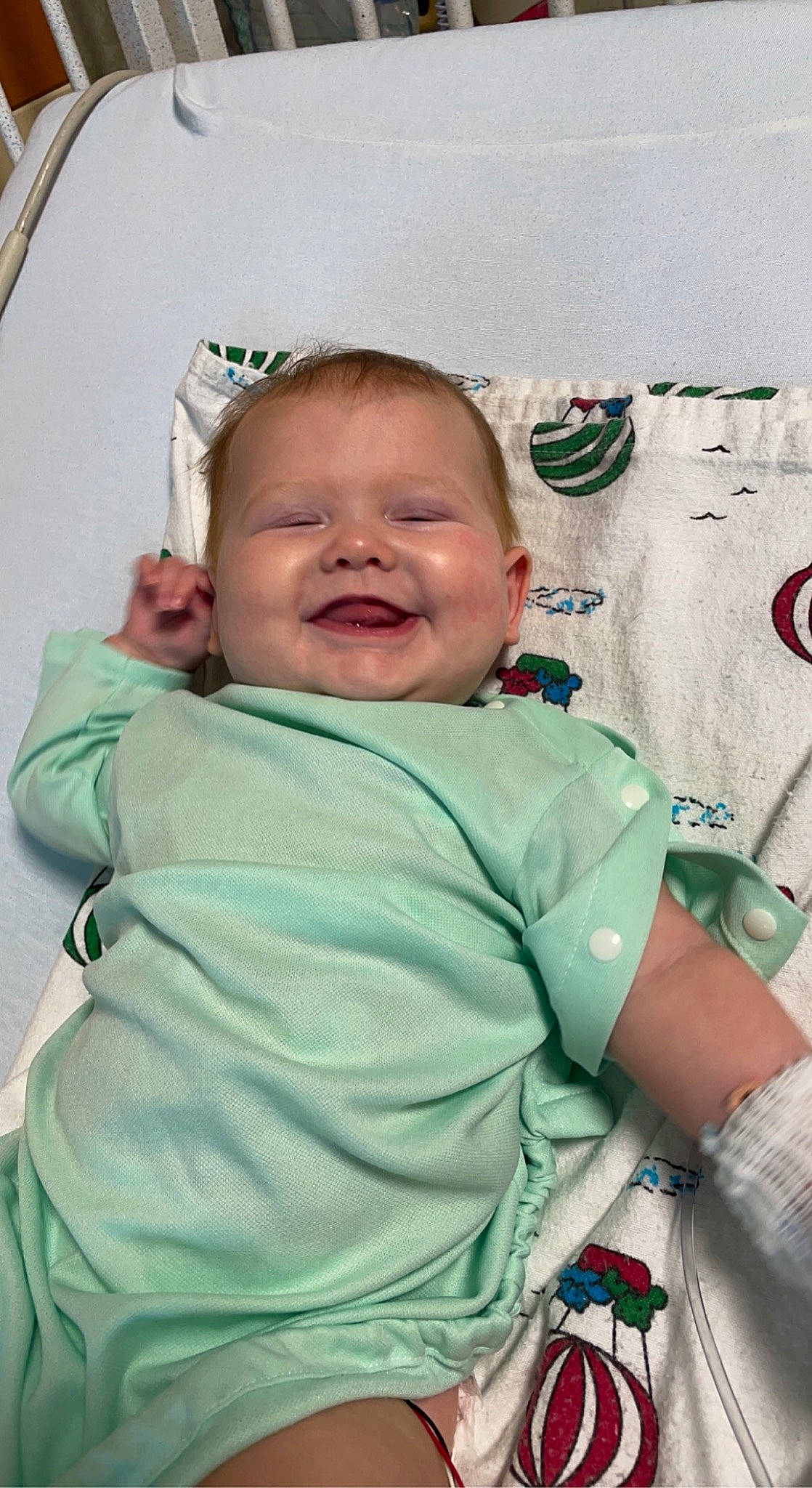 Huntley is registered to the contest to win money with this photo: baby, baby_products, baby_toddler_clothing, cheek, child, chin, comfort, event, eye, eyebrow, happy, head, joy, linens, mouth, person, pink, skin, sleeve, smile