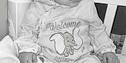 Shelsy a rejoint le concours — aidez-le/la à gagner de superbes lots ! baby, infant, crib, blanket, toy, onesie, elephant, clothing, face, hand, footwear, bedroom, sleepwear, cute, child, monochrome, soft, comfort, portrait, indoor