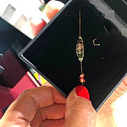Inaya participe au concours pour gagner de l'argent avec cette photo : bead, earrings, fashion_accessory, finger, hand, jewellery, nail, thumb