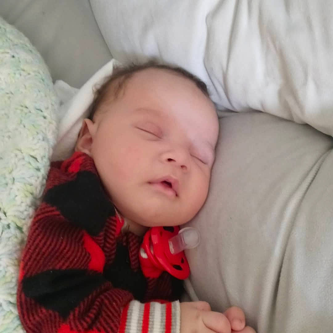Karsen joined the competition — help win amazing prizes! baby, baby_sleeping, baby_toddler_clothing, cheek, child, collar, comfort, finger, gesture, happy, head, linens, lip, nose, person, plaid, skin, sleeve, tartan, textile