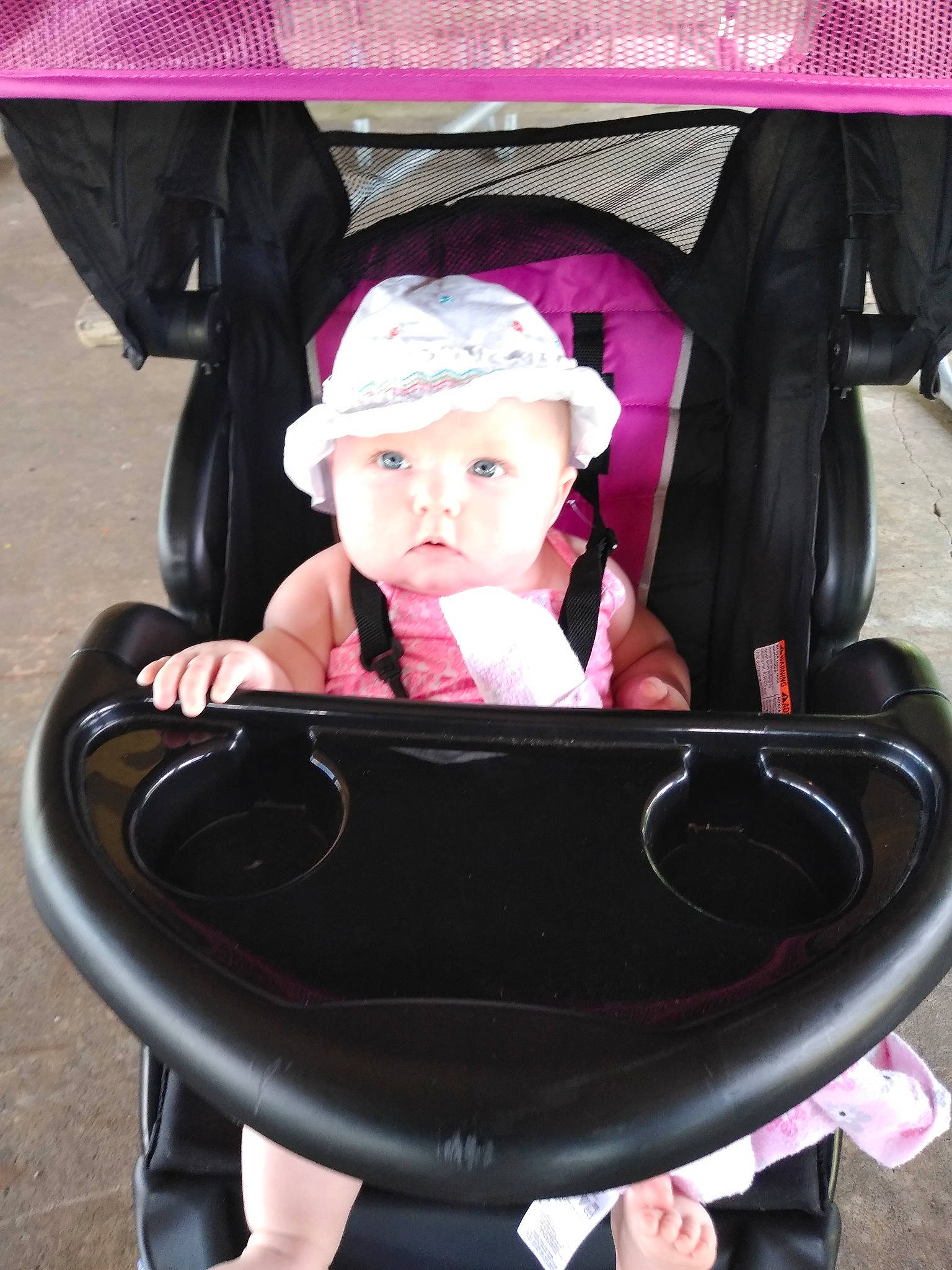Harlynn is registered to the contest to win money with this photo: baby_carriage, baby_products, car_seat, chair, child, person, pink, product, sitting