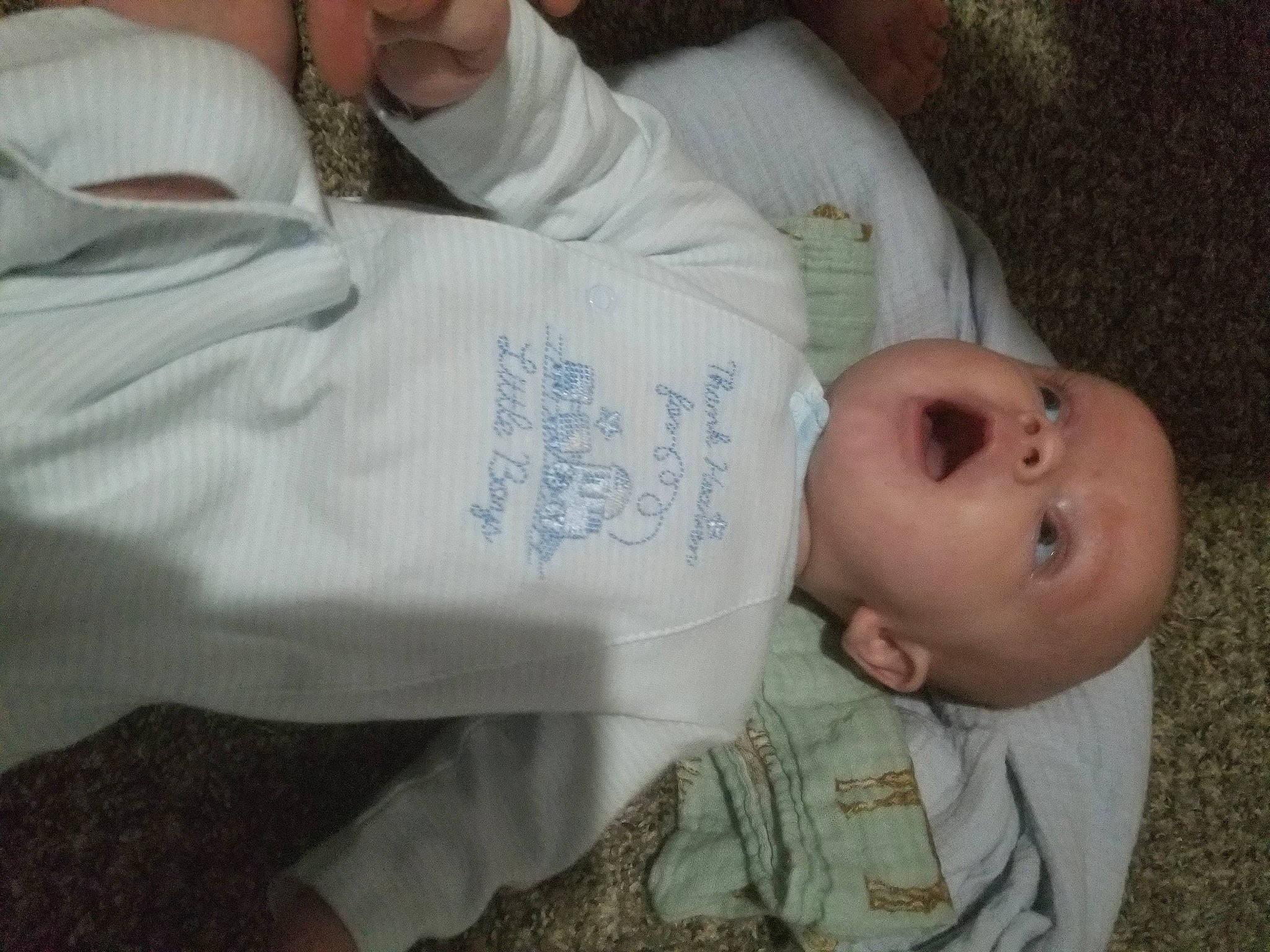 Johnathon is registered to the contest to win money with this photo: baby, baby_products, baby_toddler_clothing, cheek, child, comfort, grass, happy, lip, mouth, nap, nose, person, plant, room, sitting, skin, sleep, sleeve, toddler