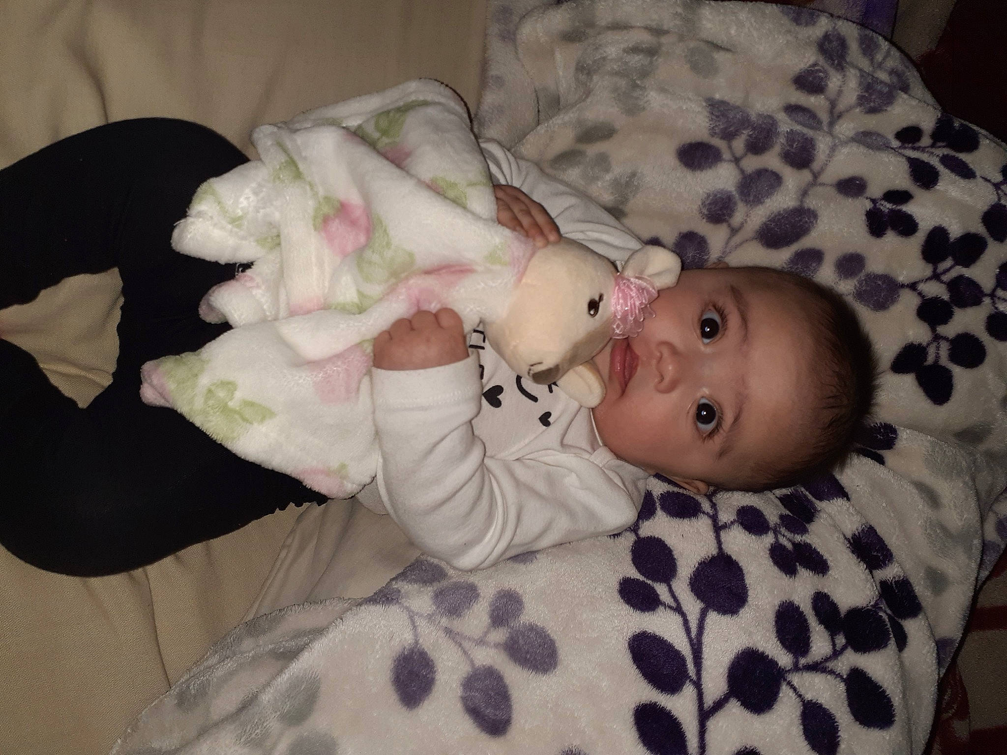 Ashanti is registered to the contest to win money with this photo: baby, baby_products, baby_toddler_clothing, cheek, child, comfort, eye, face, finger, head, iris, linens, mouth, nose, person, room, sitting, skin, sleep, toddler