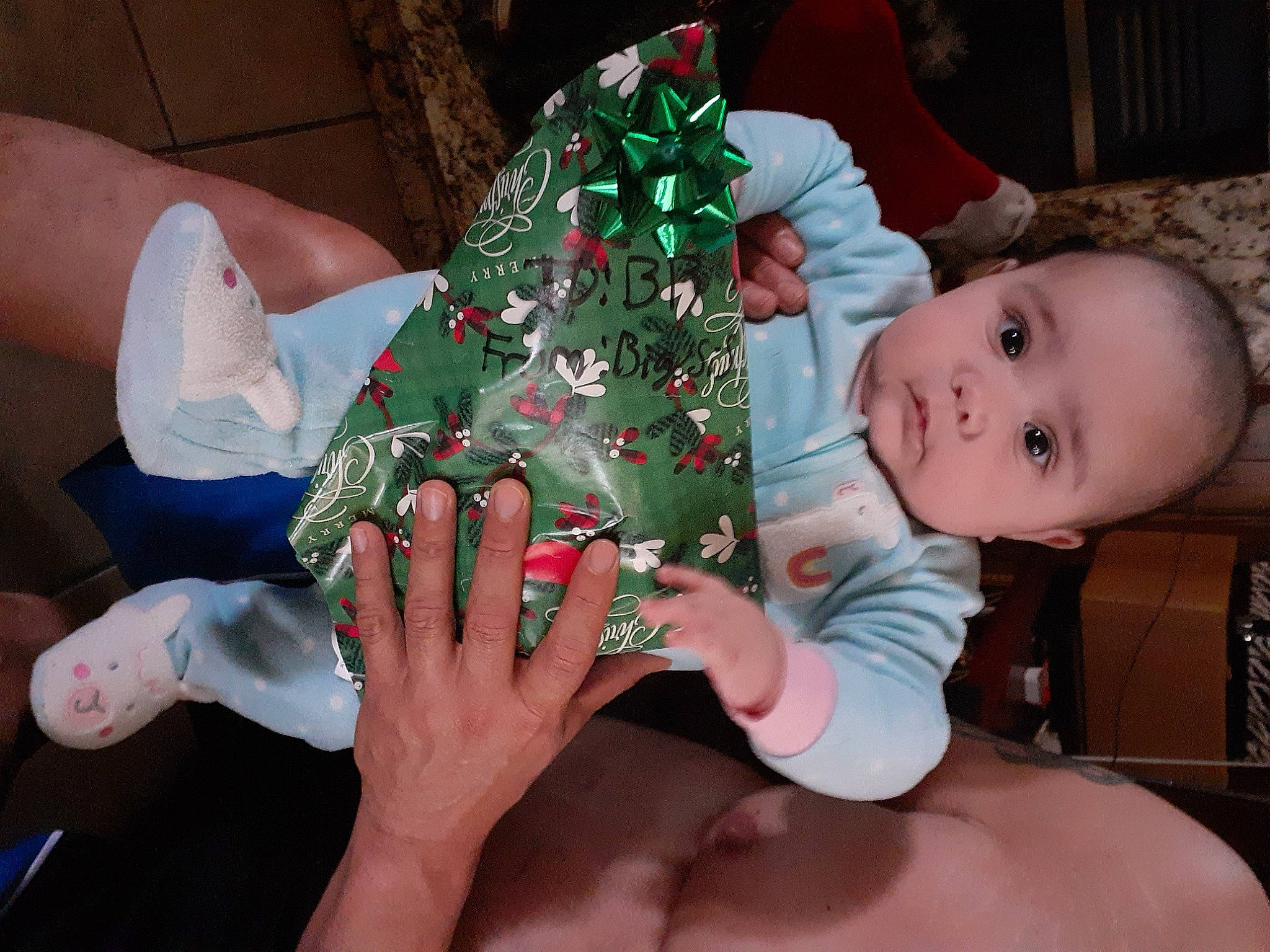 Phoebe joined the competition — help win amazing prizes! baby, baby_toddler_clothing, child, christmas, event, finger, foot, fun, green, holiday, human_leg, lap, leaf, nail, people, person, textile, thigh, thumb, toddler