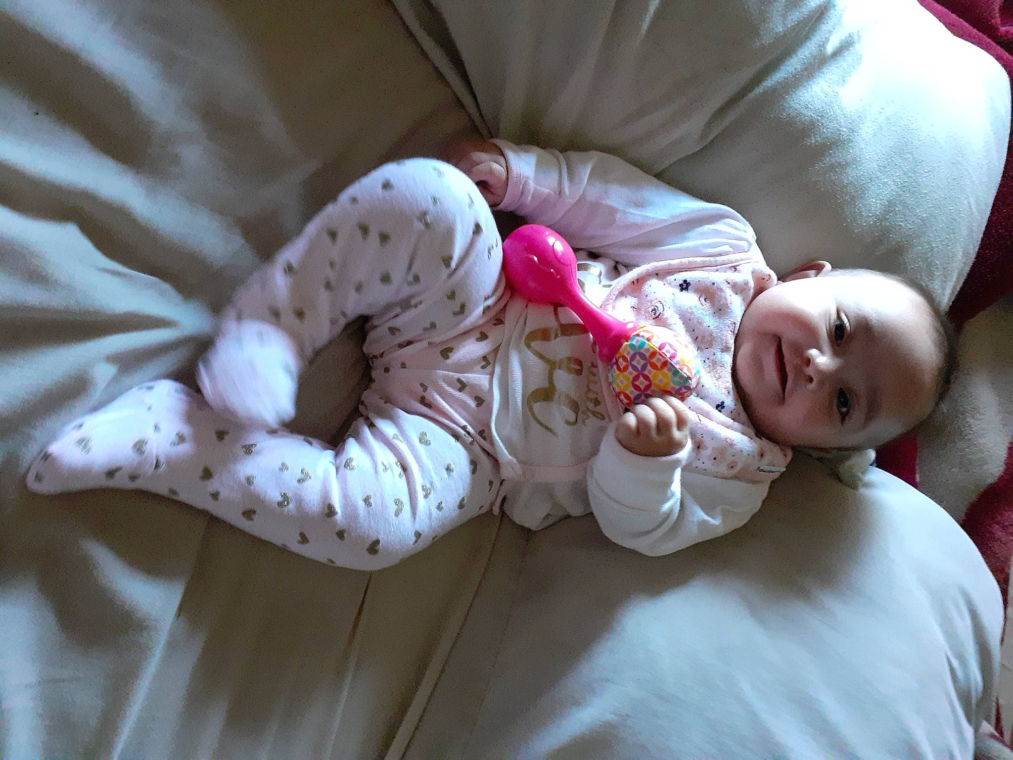 Phoebe is registered to the contest to win money with this photo: baby, baby_toddler_clothing, bedding, child, comfort, couch, fur, happy, linens, nap, pattern, person, room, sitting, sleep, sleeve, smile, toddler