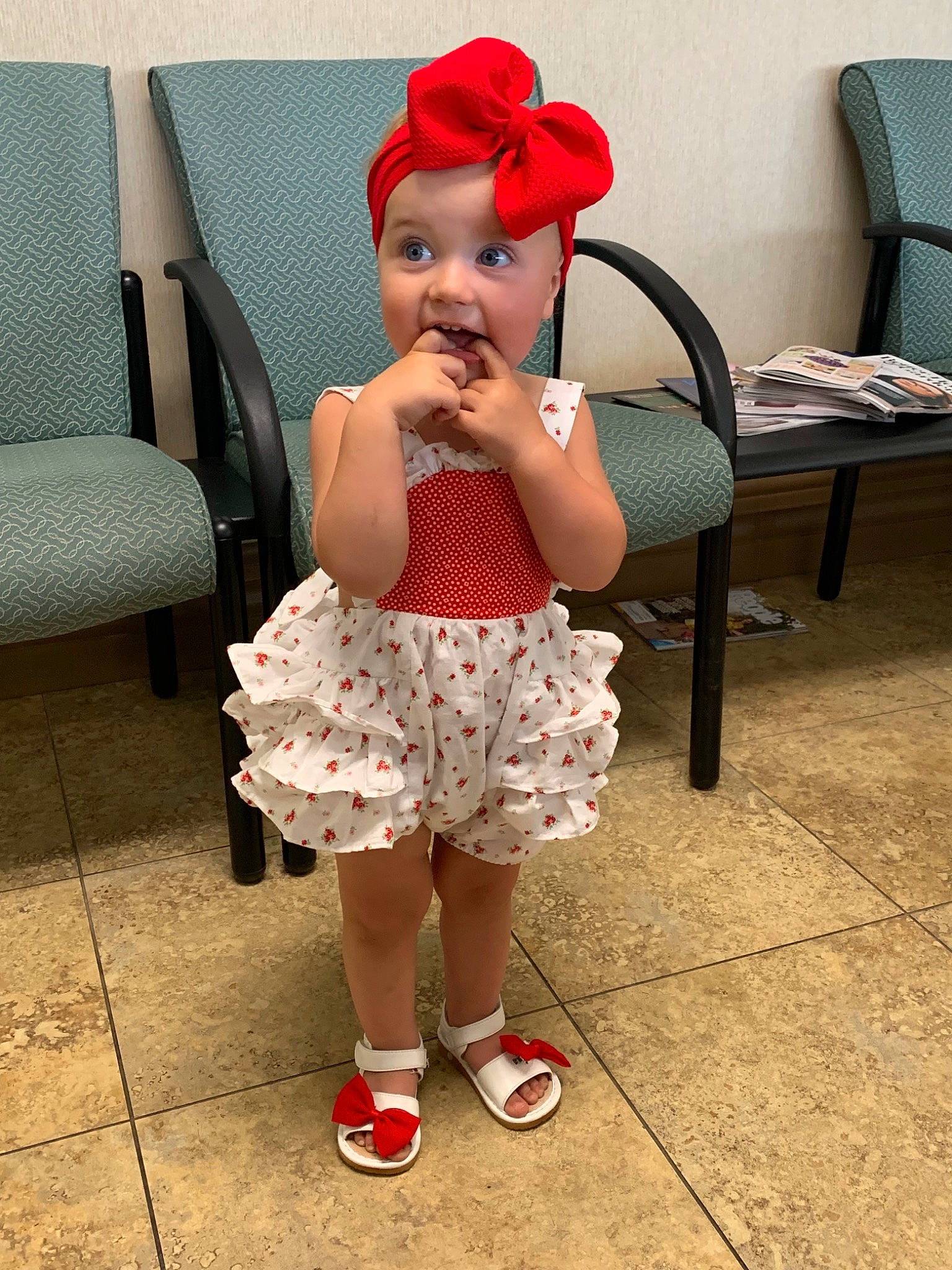 Kenzleigh is registered to the contest to win money with this photo: baby_toddler_clothing, child, clothing, costume, design, fashion_accessory, hair_accessory, happy, headgear, joint, leg, pattern, person, red, shoe, shoulder, smile, sun_hat, toddler