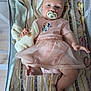 Harper joined the competition — help win amazing prizes! baby, infant, pacifier, pink_dress, minnie_mouse, blanket, soft_toy, playpen, mesh_sides, foot, hand, lying_down, cute, child, indoors, patterned_blanket, fabric, person, toddler, sleepwear