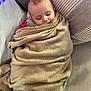 baby, blanket, child, clothing, comfort, couch, cozy, face, head, homedecor, indoors, infant, nap, peaceful, pillow, relaxation, rest, sleeping, soft_texture, wrapped