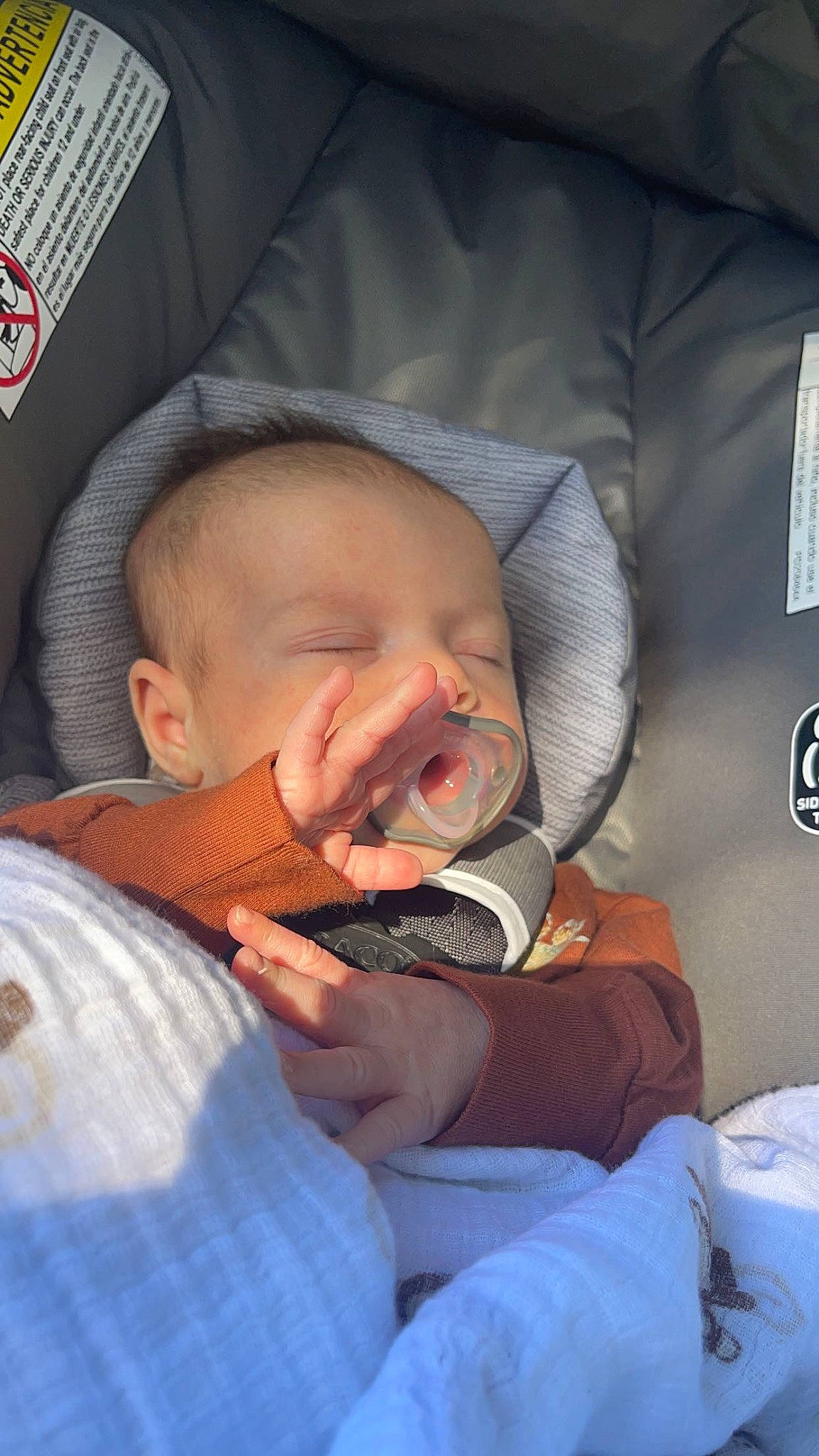 Aaron is registered to the contest to win money with this photo: baby, baby_in_car_seat, baby_products, baby_sleeping, baby_toddler_clothing, bedtime, cheek, child, comfort, ear, finger, head, linens, mouth, nap, nose, person, skin, textile, thumb