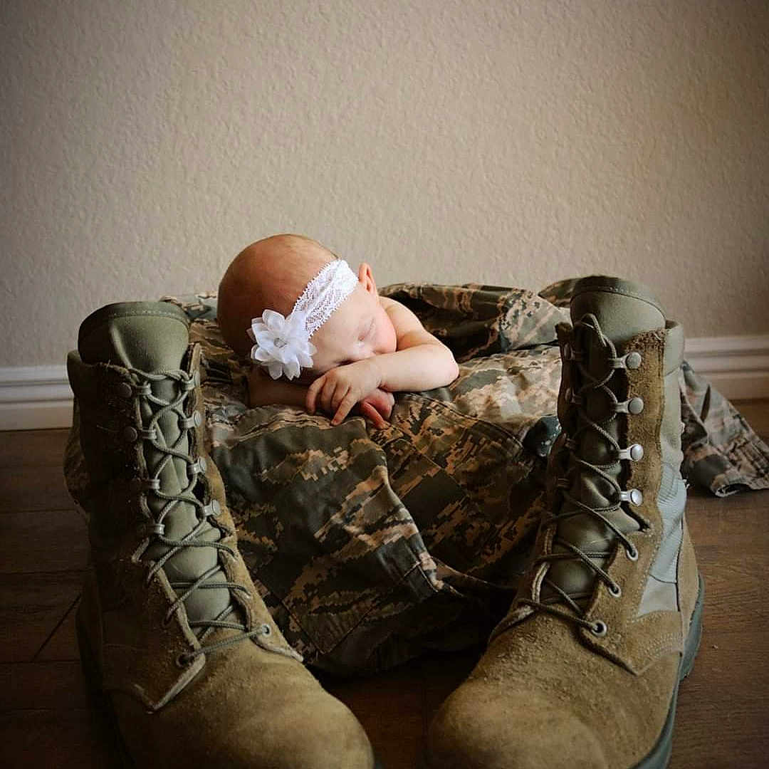 Dani is registered to the contest to win money with this photo: baby, beige, boot, child, comfort, footwear, leg, outdoor_shoe, photography, shoe, sitting, stock_photography, toddler