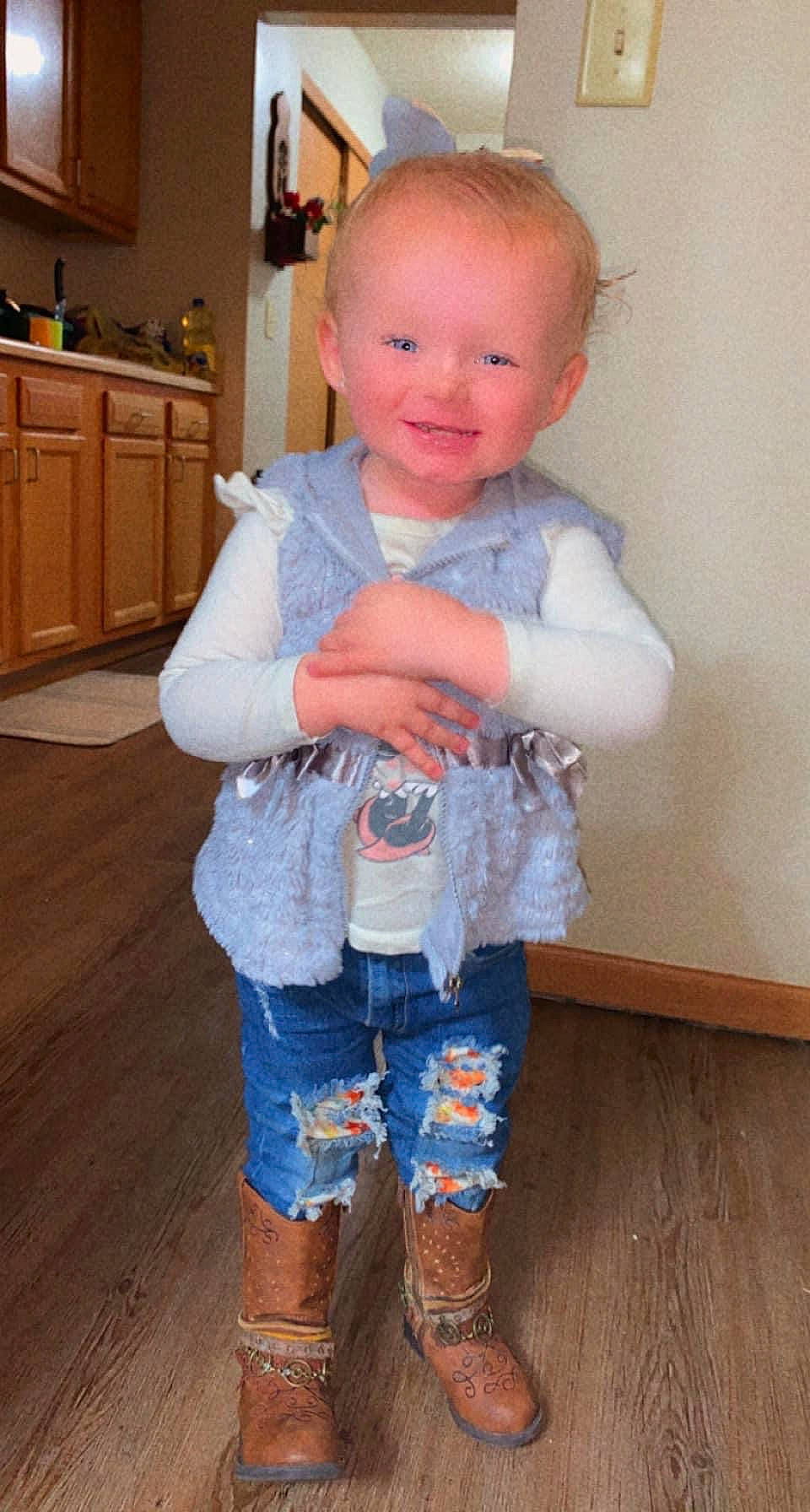 Alaylah is registered to the contest to win money with this photo: baby, baby_toddler_clothing, cabinetry, cheek, denim, drawer, electric_blue, face, flooring, fun, hairstyle, joy, leg, person, skin, sleeve, smile, standing, t_shirt, toddler