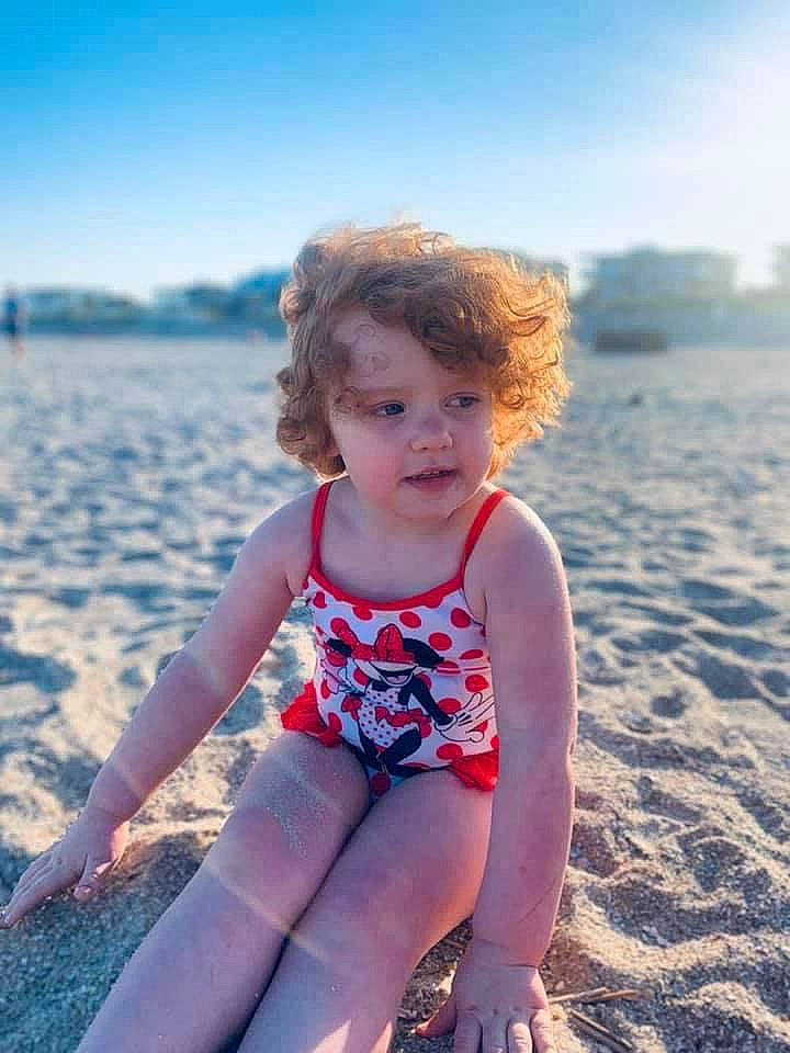 Violet is registered to the contest to win money with this photo: azure, barefoot, beach, beauty, body_of_water, electric_blue, flash_photography, fun, hair, happy, human_leg, people_in_nature, people_on_beach, person, sand, sky, snapshot, summer, sunlight, thigh