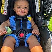 Jakai joined the competition — help win amazing prizes! baby, car_seat, child, smile, blue_clothing, bottle, sunlight, straps, happy, infant, outdoor, seatbelt, person, sitting, cute, toddler, safety, closeup, daylight, baby_bottle