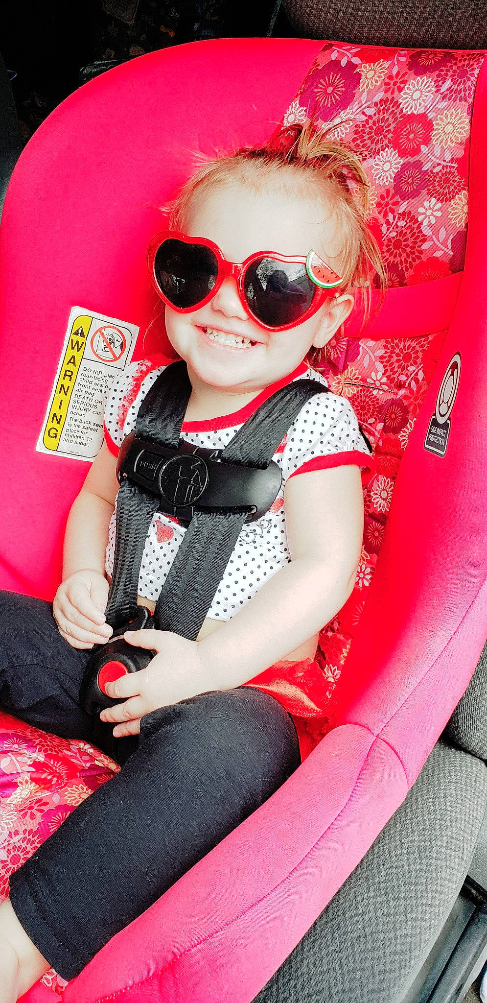 Dorothy is registered to the contest to win money with this photo: car_seat, car_seat_cover, cool, eyewear, photography, pink, sunglasses