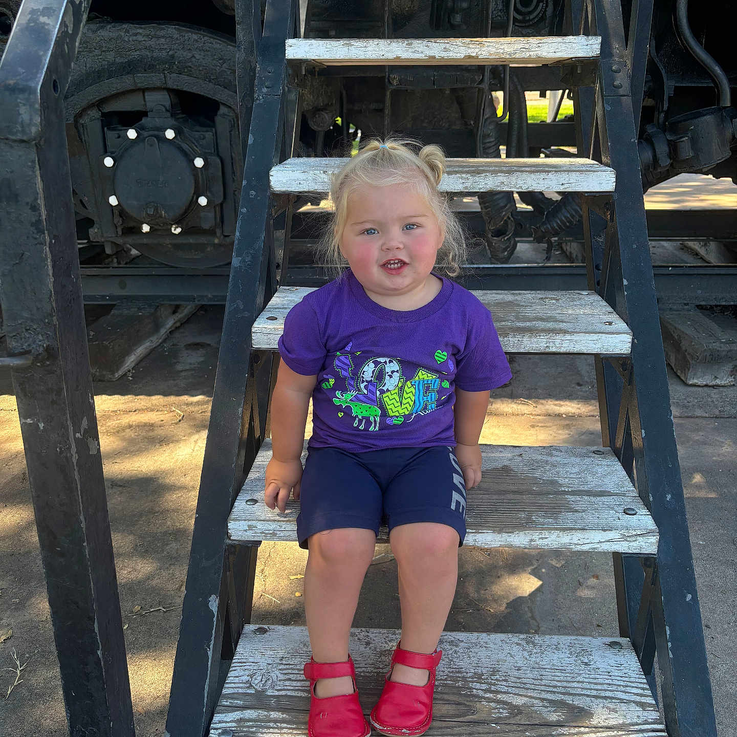 Lainey Rae joined the competition — help win amazing prizes! architecture, building, child, clothing, face, female, footwear, girl, head, house, housing, pants, person, photography, portrait, shoe, shorts, staircase, t_shirt, wood