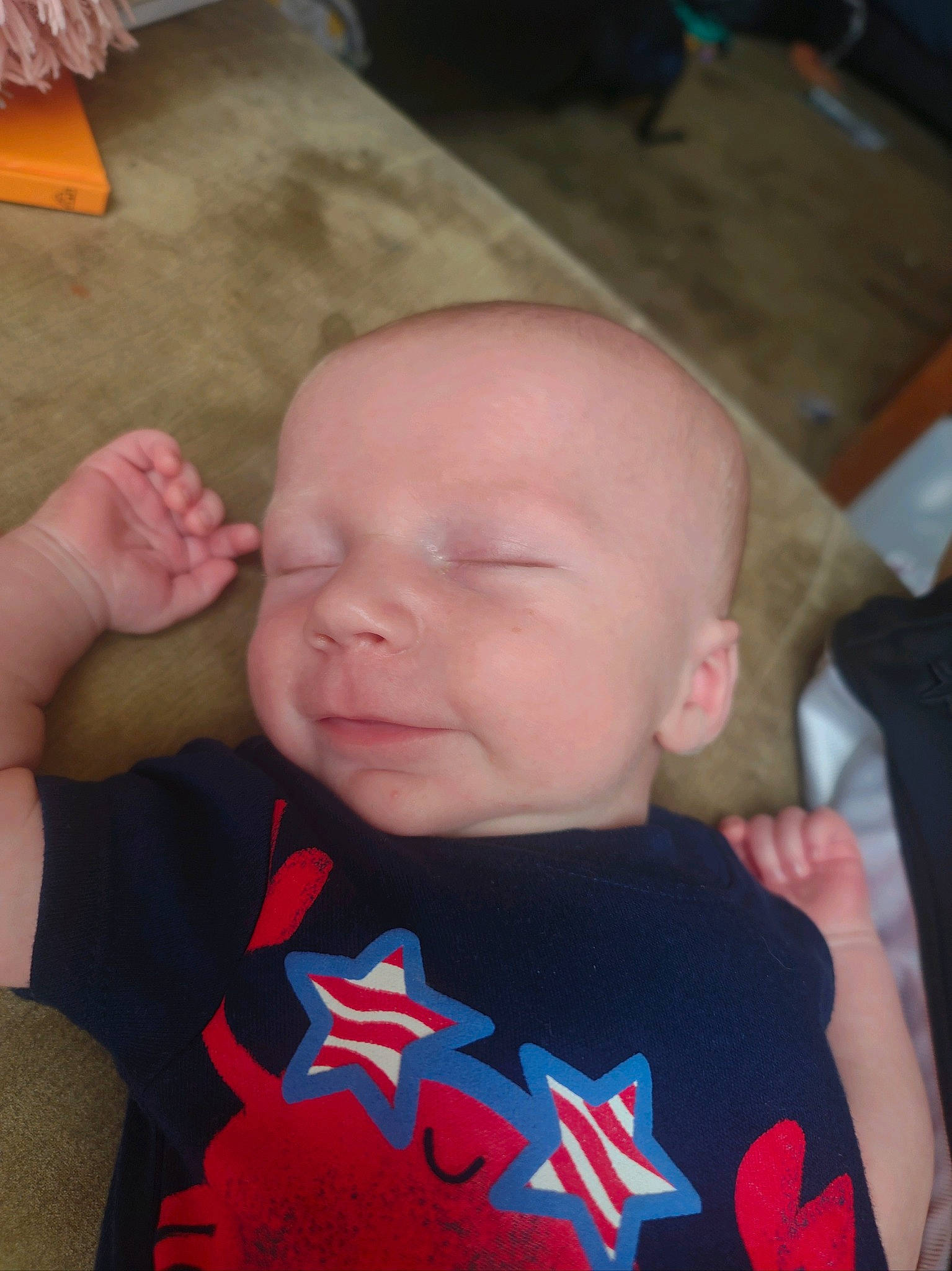 Brett is registered to the contest to win money with this photo: baby, baby_toddler_clothing, cheek, child, chin, ear, eye, finger, forehead, gesture, hairstyle, happy, head, lip, mouth, neck, nose, person, skin, sleeve