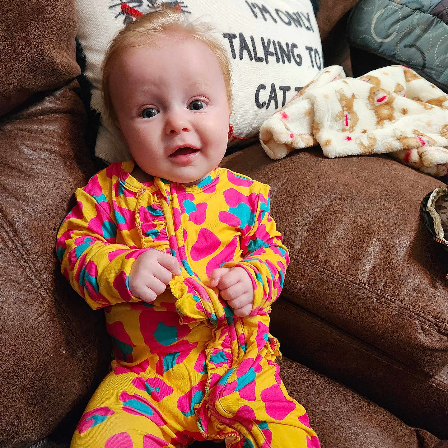 Aoife is registered to the contest to win money with this photo: architecture, baby, bodypart, building, clothing, couch, cushion, face, finger, furniture, hand, head, homedecor, indoors, livingroom, pajamas, person, photography, portrait, room