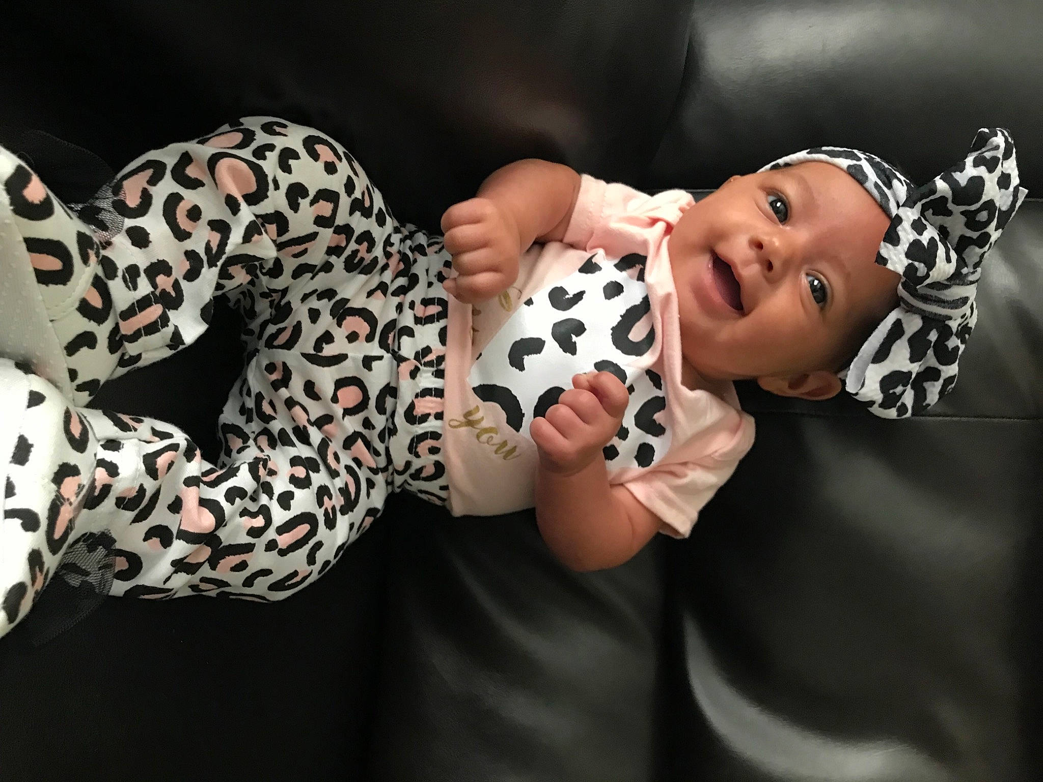 Jazlyn is registered to the contest to win money with this photo: arm, baby, baby_toddler_clothing, event, eyelash, fashion_accessory, felidae, finger, flash_photography, fur, hand, head, headgear, headwear, human_body, jewellery, nail, neck, pattern, person