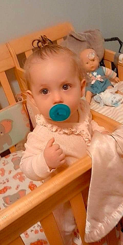 Laila joined the competition — help win amazing prizes! baby, baby_safety, baby_toddler_clothing, cheek, child, cradle, dress, eyelash, happy, human_body, infant_bed, iris, mouth, nose, person, pink, product, skin, textile, toddler