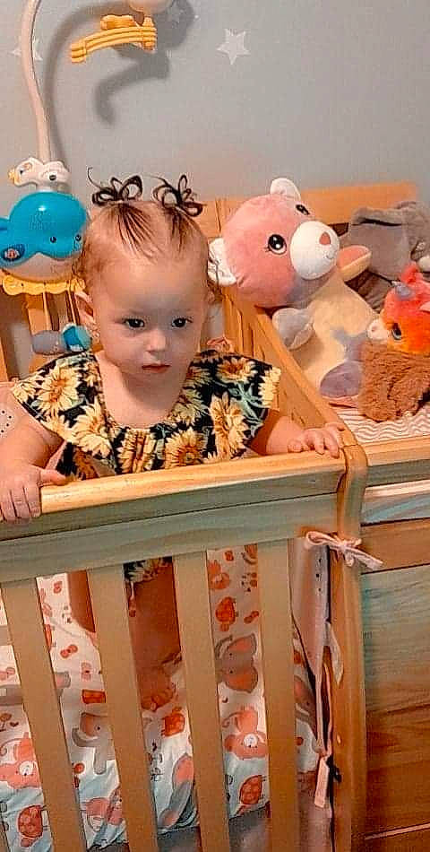 Laila joined the competition — help win amazing prizes! baby, baby_toddler_clothing, child, cradle, happy, head, infant_bed, jewellery, nursery, orange, pattern, peach, person, pink, product, room, teddy_bear, textile, toy, white