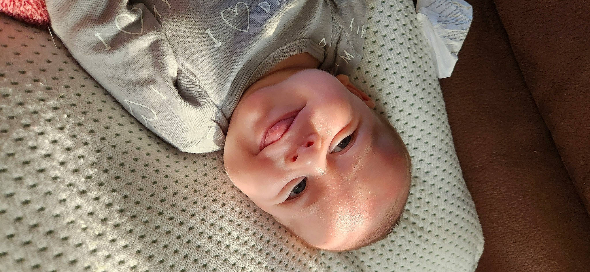 Luca is registered to the contest to win money with this photo: baby, baby_toddler_clothing, cheek, child, comfort, eye, eyebrow, eyelash, face, fashion_accessory, fun, happy, headgear, iris, joy, lip, mouth, nose, person, smile