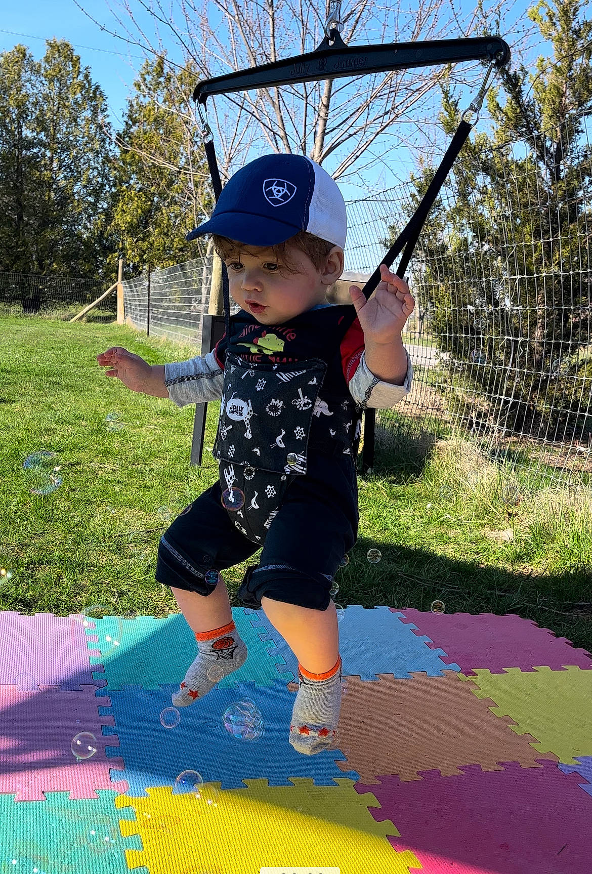 Kaleb joined the competition — help win amazing prizes! cap, city, electric_blue, fun, grass, happy, hat, headwear, leisure, outdoor_play_equipment, people_in_nature, person, plant, playground, public_space, recreation, shade, sky, sun_hat, t_shirt
