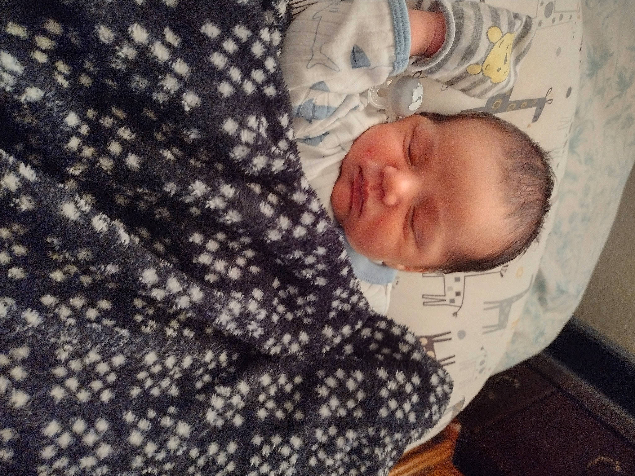 Nicolas is registered to the contest to win money with this photo: baby, baby_products, baby_safety, baby_sleeping, baby_toddler_clothing, bedtime, child, comfort, linens, nap, pattern, person, room, sleep, sleeve, toddler