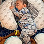 Adler joined the competition — help win amazing prizes! baby, sleeping, pajamas, pacifier, pillow, elephant_print, blanket, toy, banana_teether, infant, sleep, cute, child, soft, comfort, nap, indoors, cozy, rest, peaceful