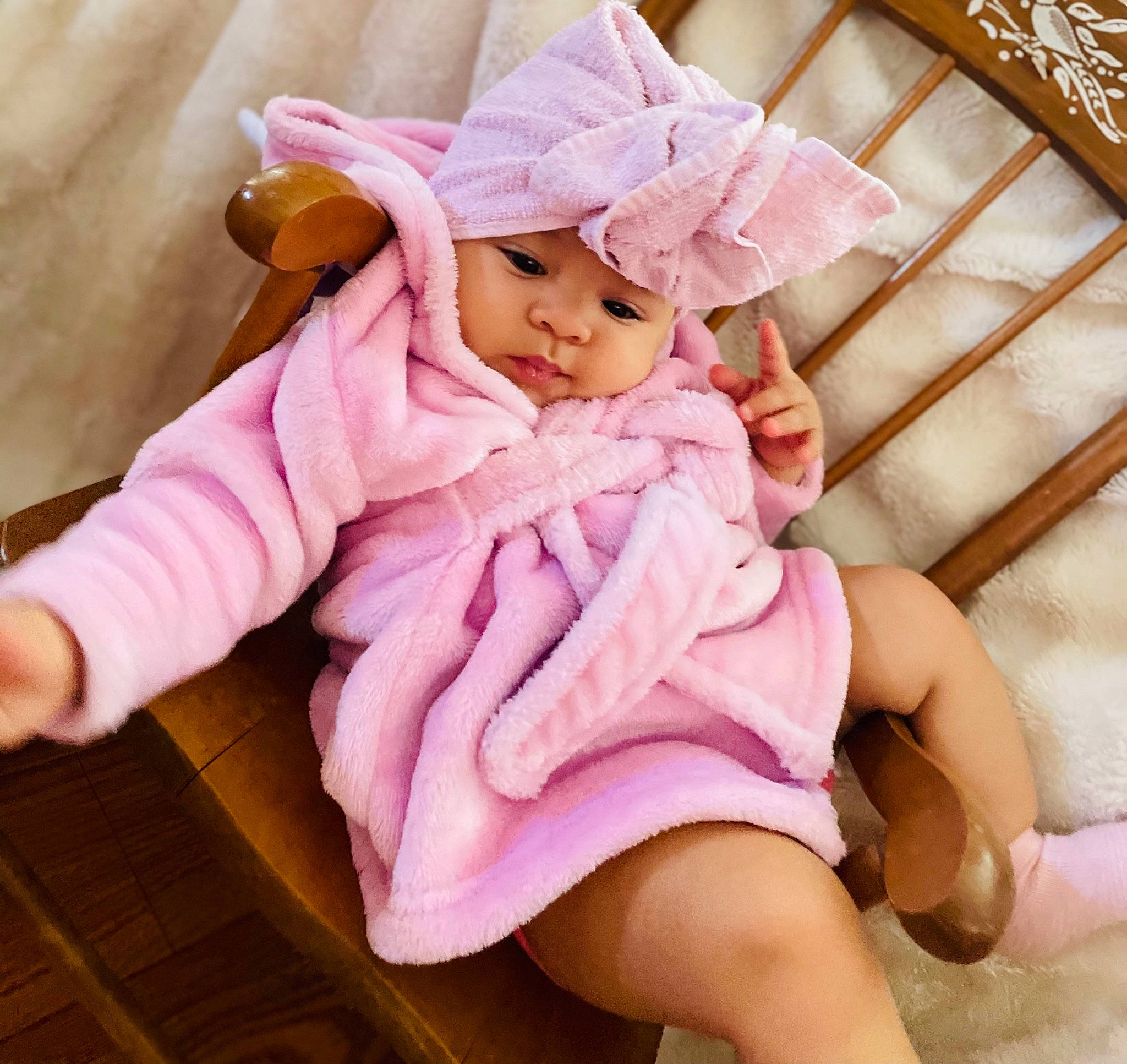 Jahzara joined the competition — help win amazing prizes! baby, baby_toddler_clothing, beauty, bed, comfort, dress, fashion_accessory, finger, headwear, leg, linens, magenta, peach, person, pink, purple, sitting, skin, sleeve, sock
