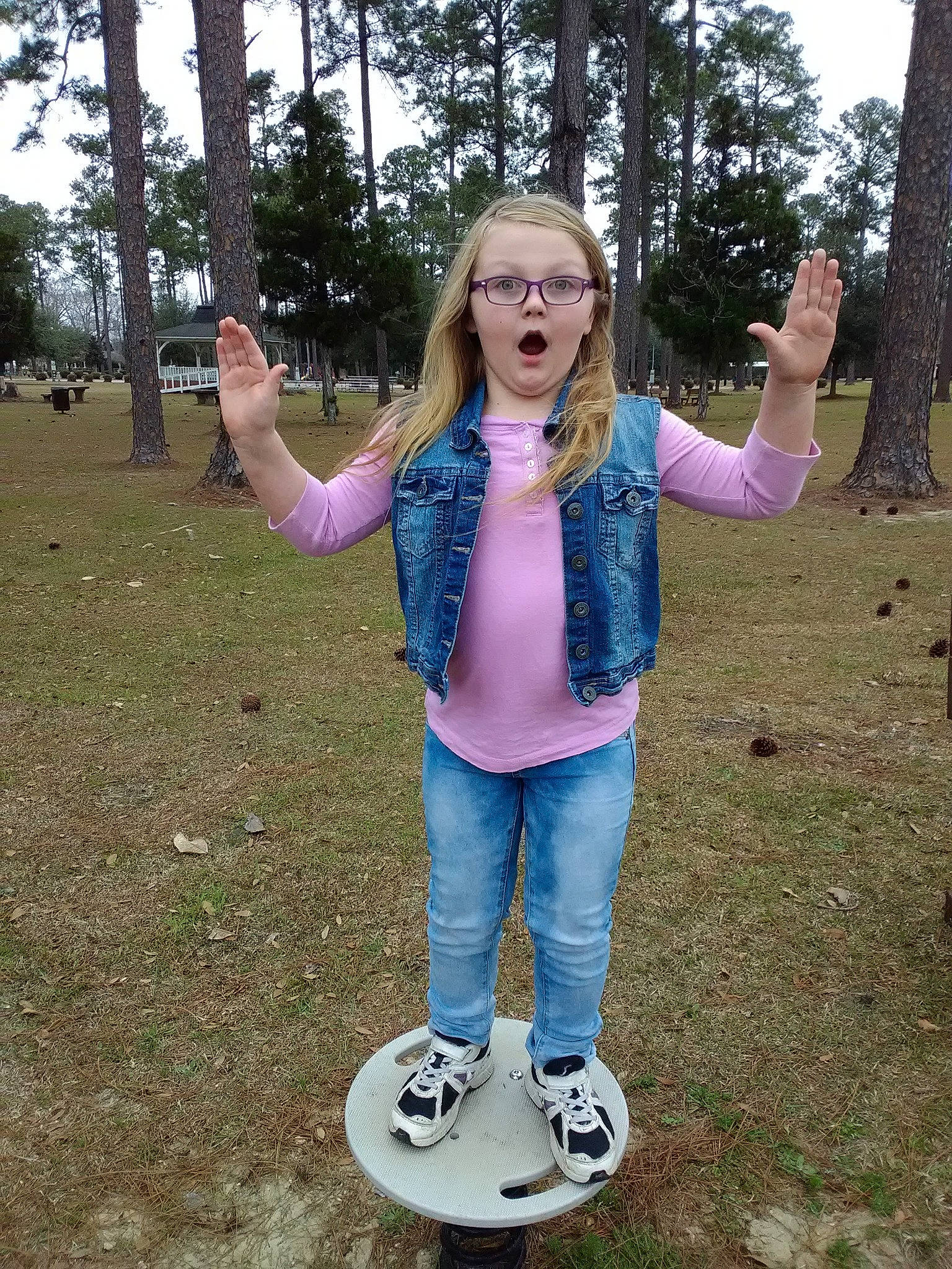Ashlynn joined the competition — help win amazing prizes! child, footwear, fun, gesture, person, photography, play, recreation, smile, surprise, tree, vacation
