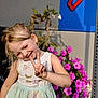 child, girl, smiling, peace_sign, dress, outdoor, flowers, pink_flowers, sunlight, blonde_hair, happy, plant, nature, colorful, portrait, summer, cute, playful, background, daylight